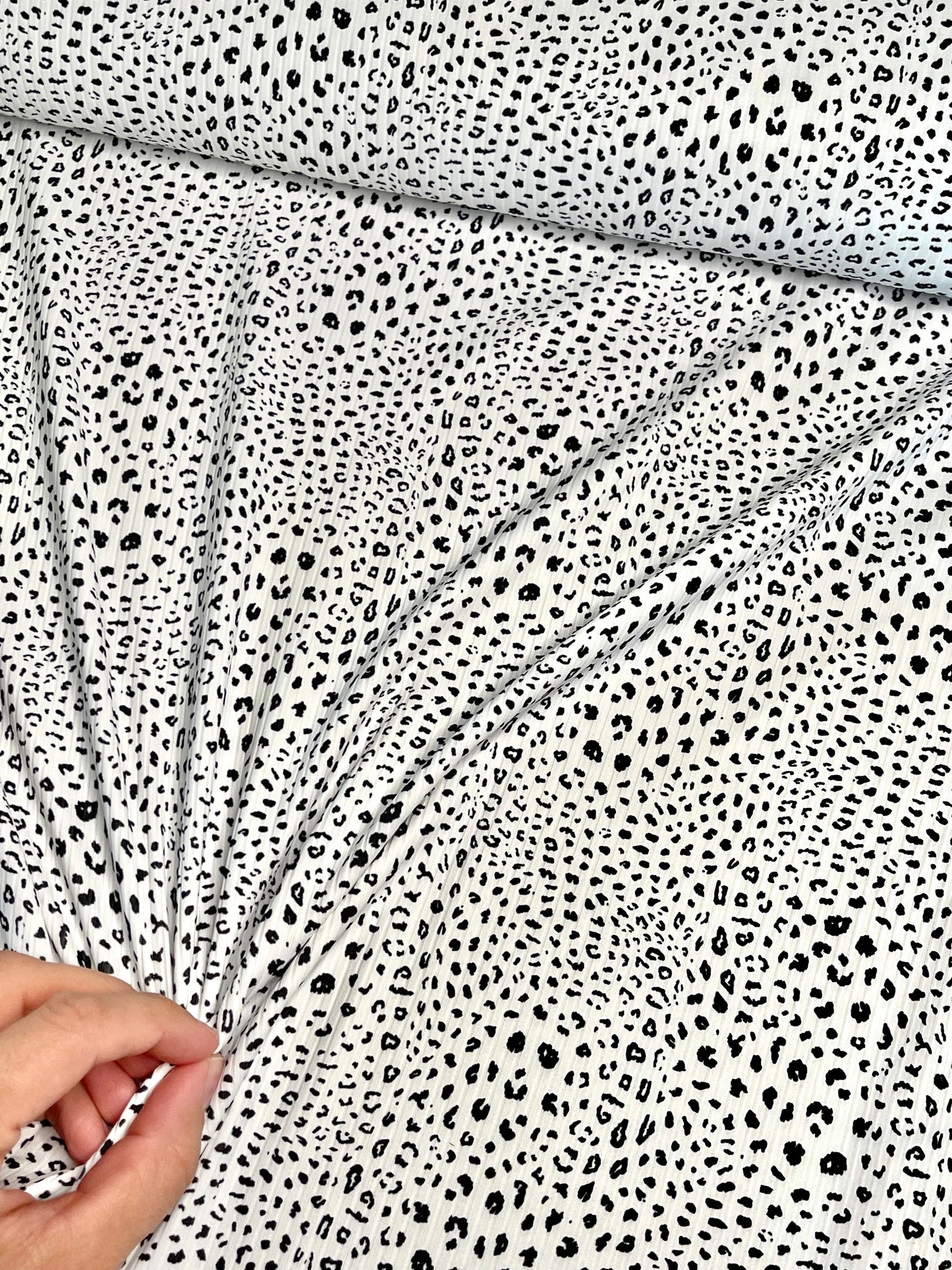 Leopard Print in White on Unbrushed Rib Knit, Sold by the Half Yard