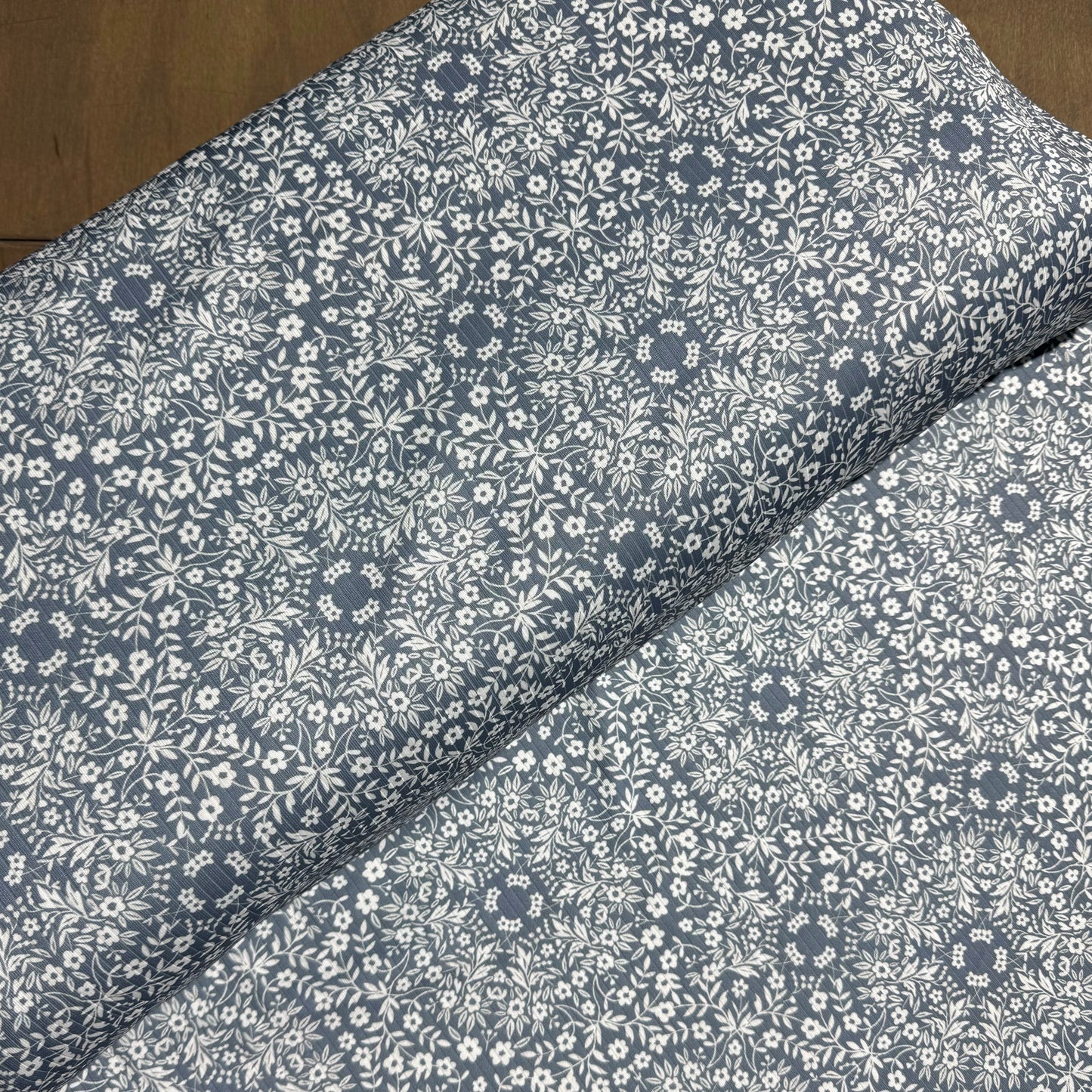 Medallion Toss in Blue on Unbrushed Rib Knit, Sold by the Half Yard